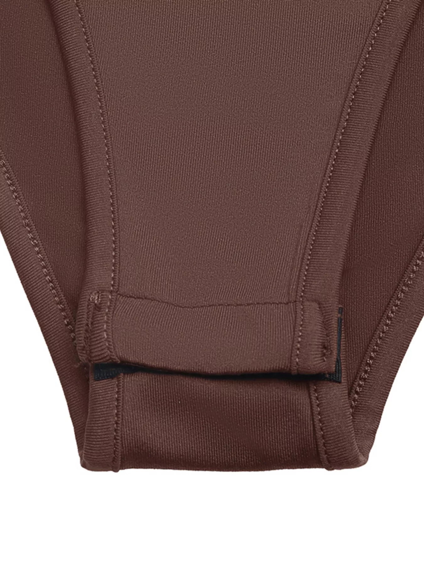 Female model in button front bodysuit long sleeve stylish look