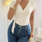 Elegant wrap fit bodysuit for women cap sleeve surplice design