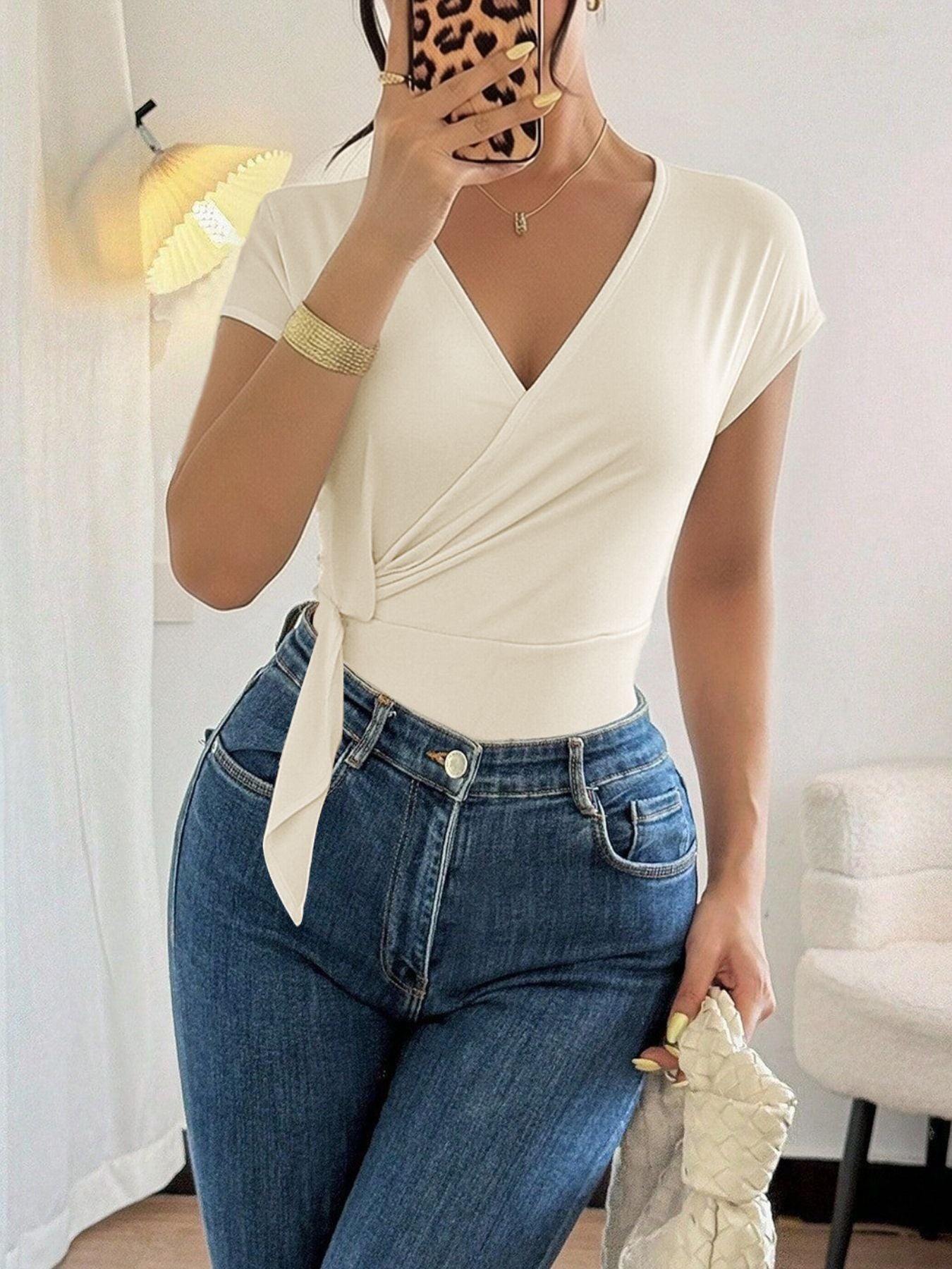 Elegant wrap fit bodysuit for women cap sleeve surplice design