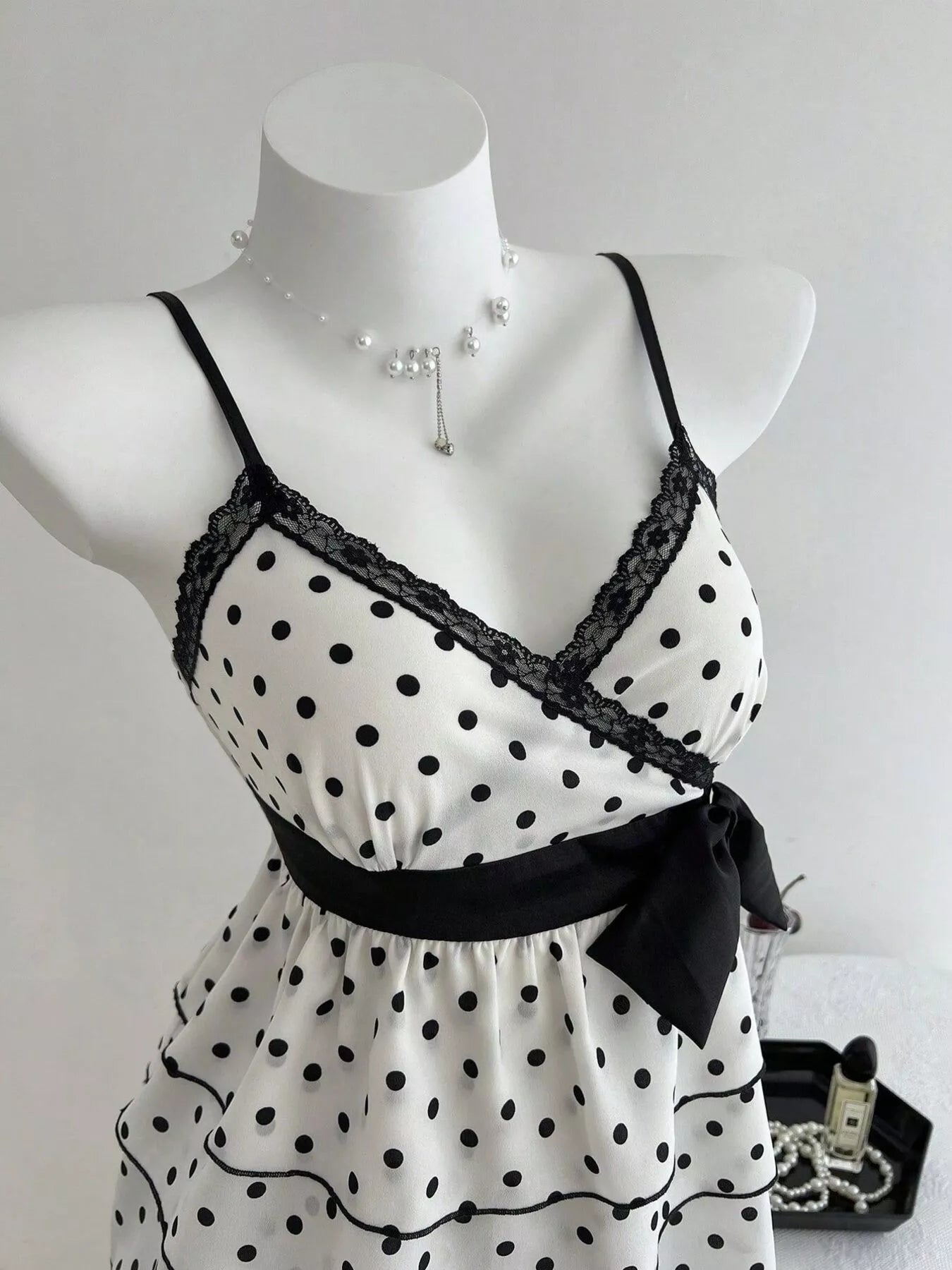 Women polka dot cami lace trim ruffle hem sleeveless top