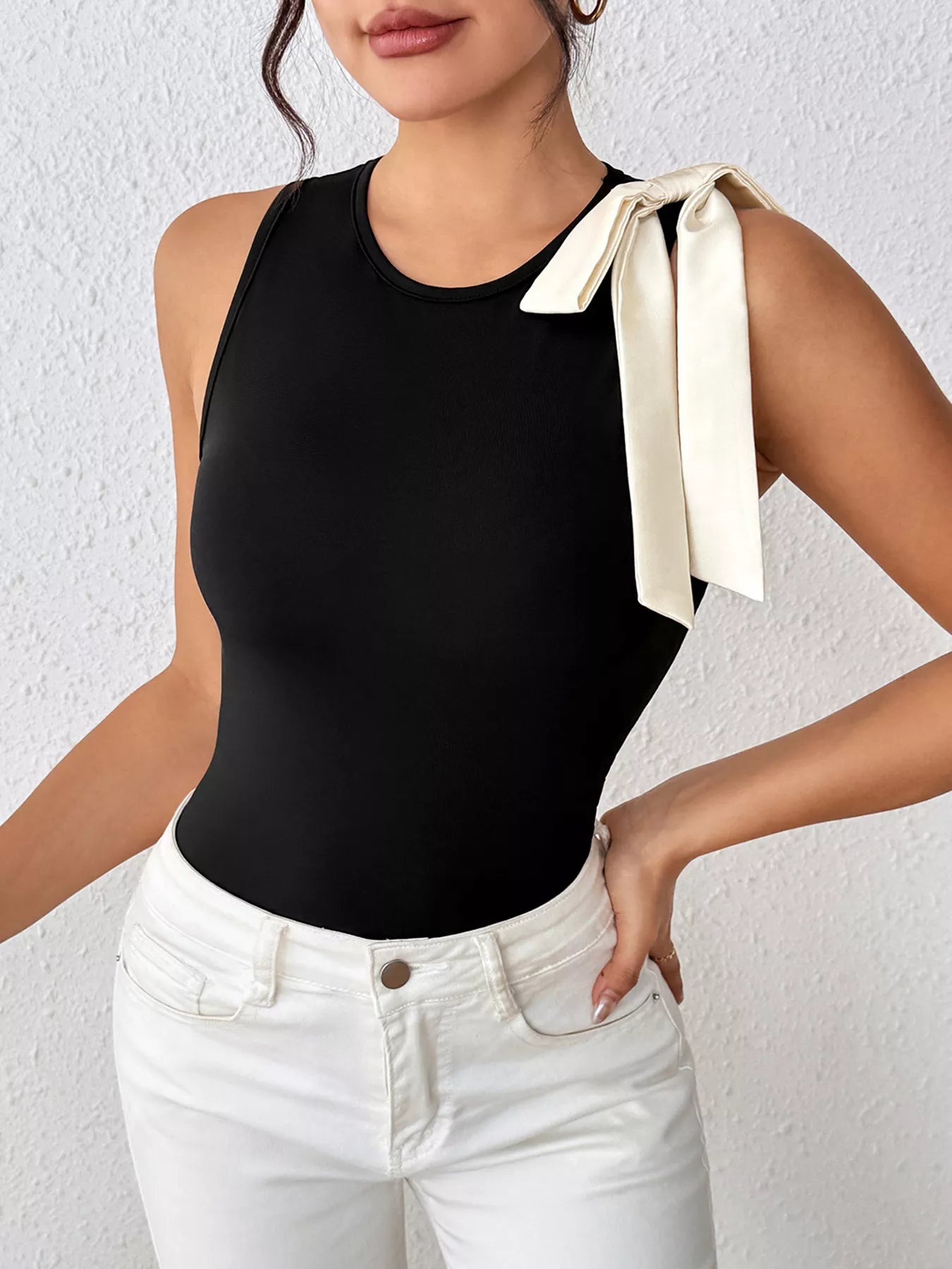 Trendy women bodysuit bow detail sleeveless casual style