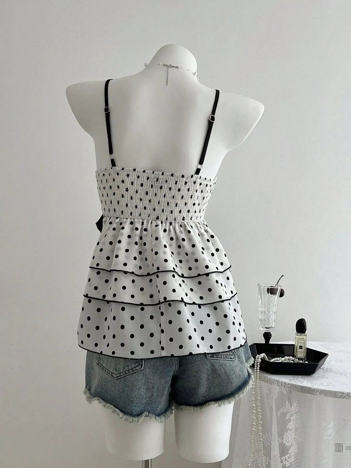 Stylish polka dot cami women lace trim ruffle hem design